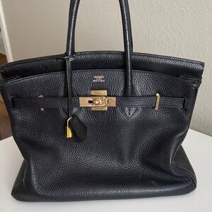 Hermès Textured Black Leather Bag with Gold Accents
